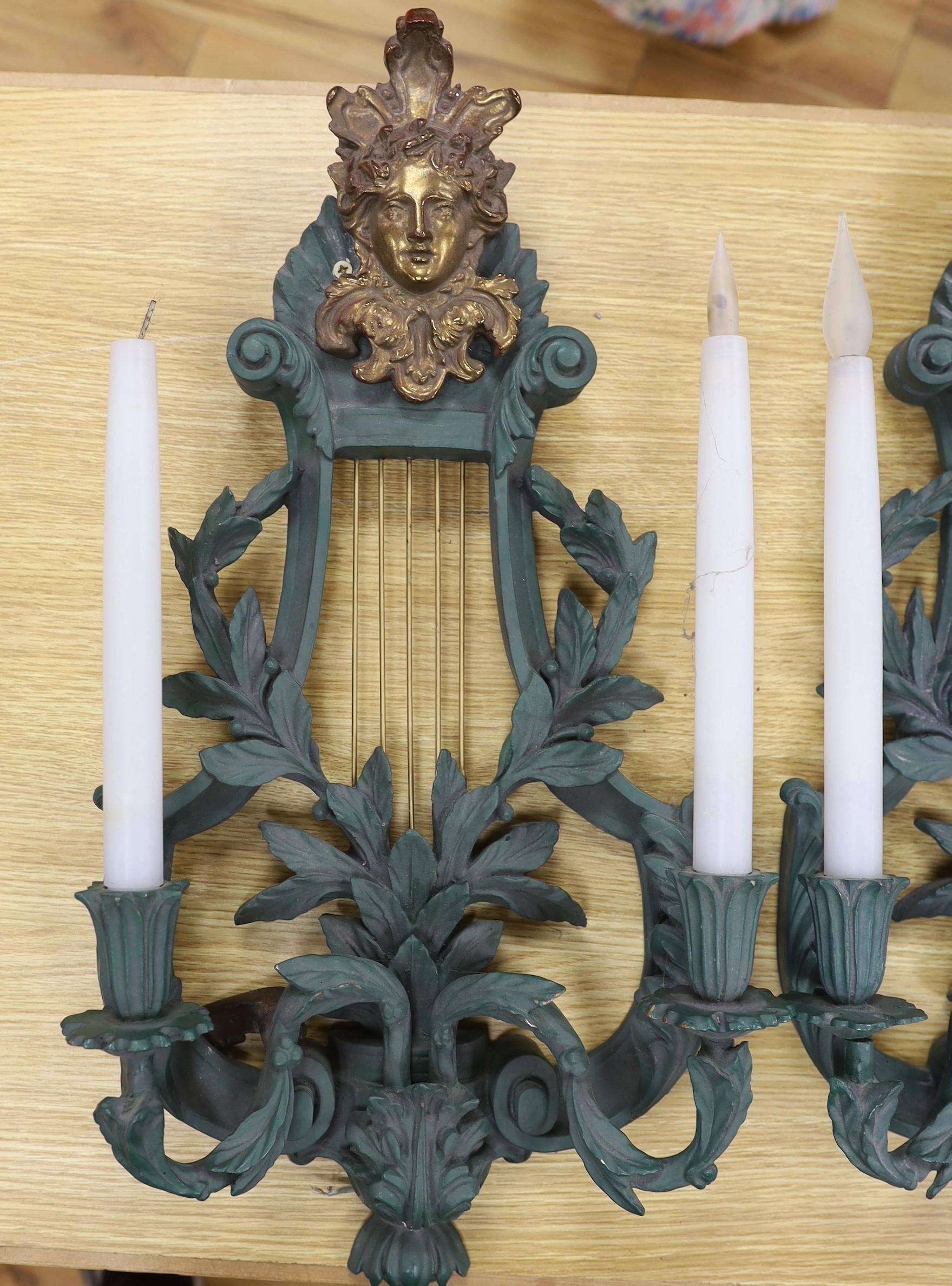 A pair of lyre shaped green resin wall lights, height 62cm